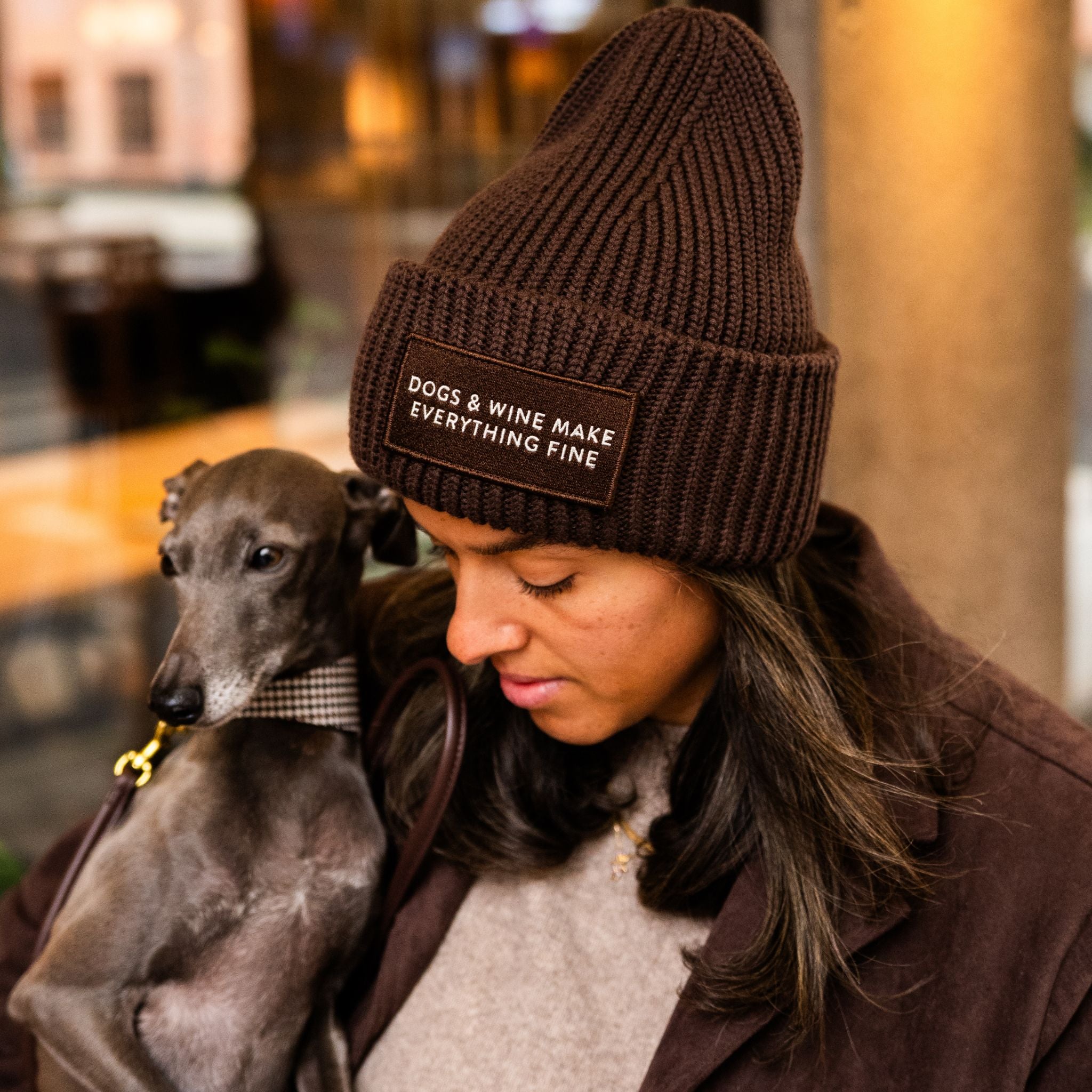 brown-wool-beanie-dogs-wine-iggy-woman-closeup.jpg